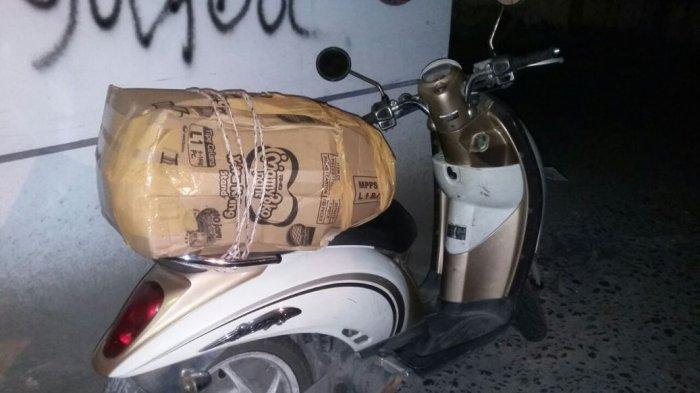 mayat di motor scoopy